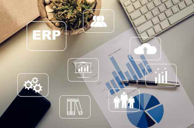 ERP Development Services concept with analytics and charts on a desk.